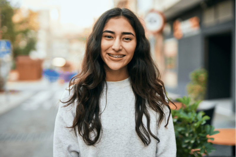Young woman smiling after orthodontic treatment at Advanced Orthodontics in Everett, WA
